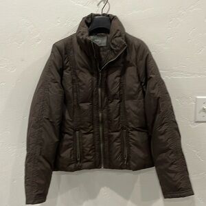 Brown puffer, cute lines, down the front, sleeves and back